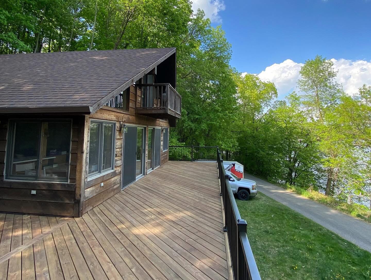 Custom multi-level cedar deck overlooking a Minnesota lake